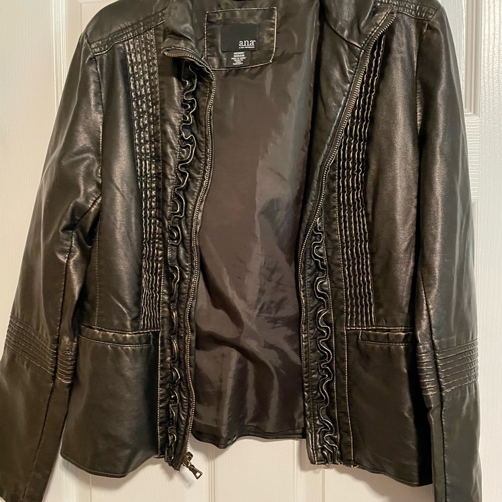 I really love this jacket it very comfortable and it is not tight anywhere.